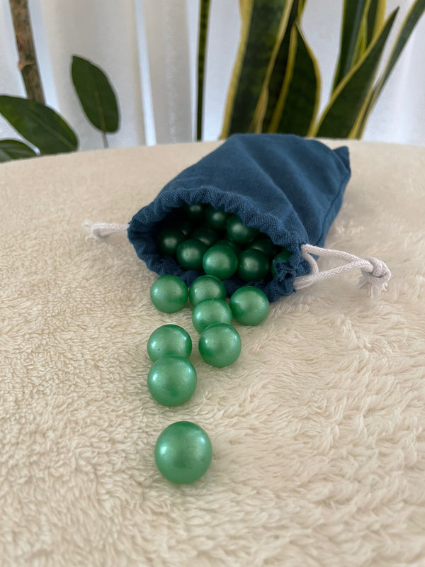 GREEN GLASS MARBLES